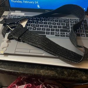New with tags black stretchy woven belt size ML 2 inches wide 36 inches long